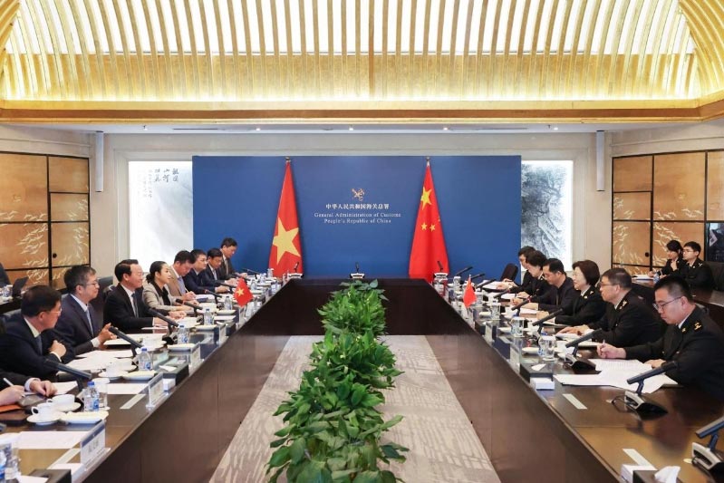 海关总署署长孙梅君会见越南农业与环境部部长杜德唯